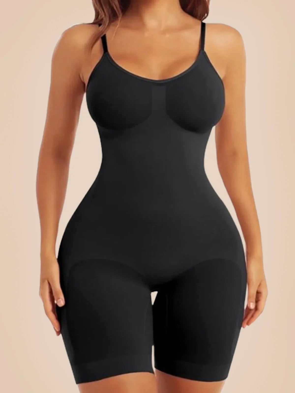 Formivelle black mid-thigh bodysuit shapewear on model, seamless sculpting fit