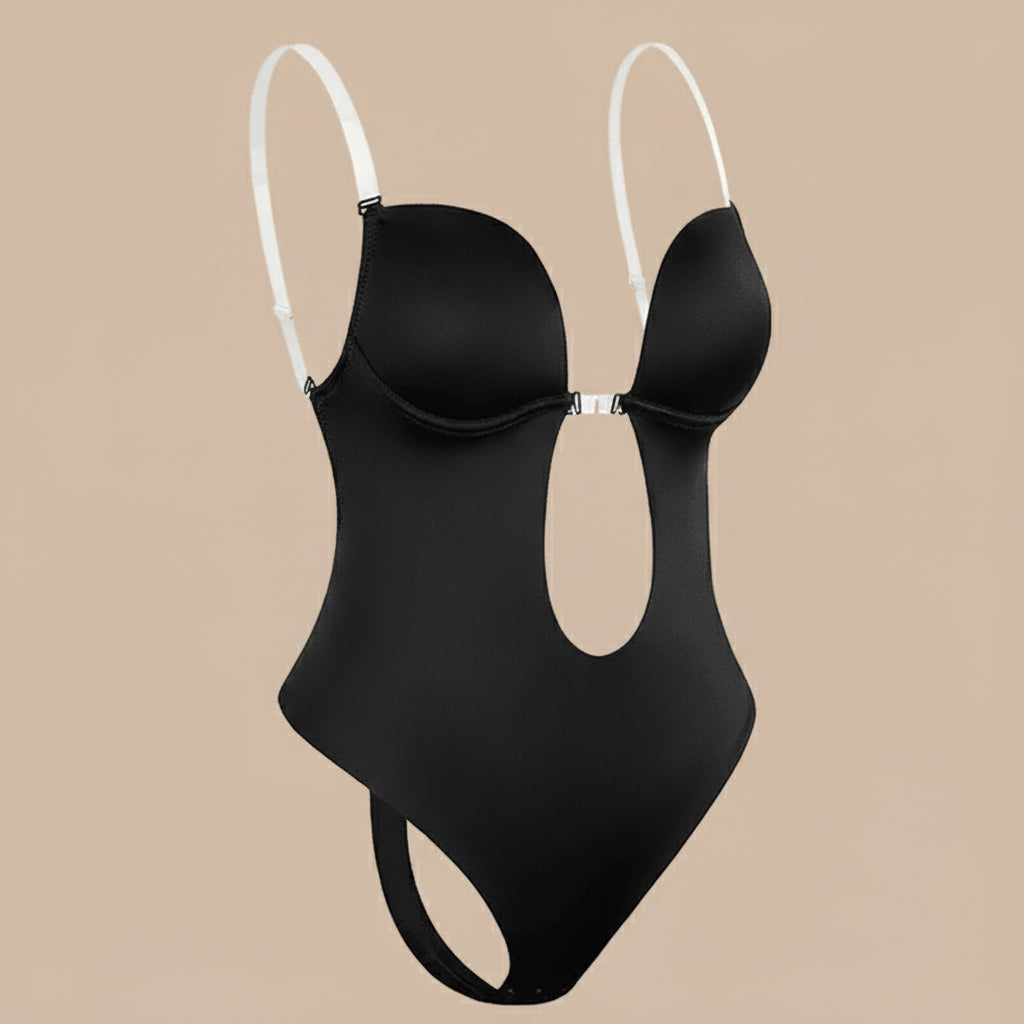 Black backless bodysuit with cut-out front and white adjustable straps on beige background