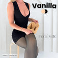 Formivelle fleece-lined tights in vanilla, model seated in black dress, showing product texture