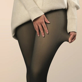 Formivelle fleece-lined tights with stretch, shown close-up under cream sweater