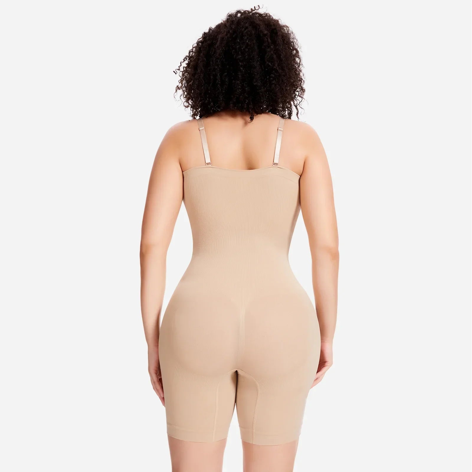 Woman wearing Formivelle nude sculpting bodysuit with convertible straps, back view