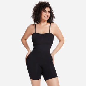 Woman wearing black Formivelle convertible strapless sculpting bodysuit on white background