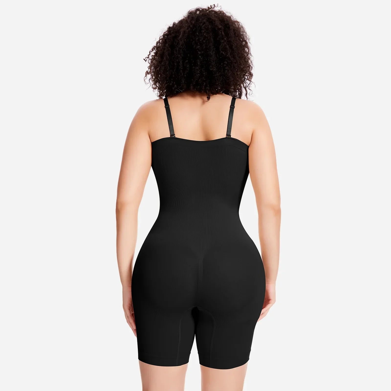 Woman modeling a black Formivelle convertible strapless sculpting bodysuit from the back.