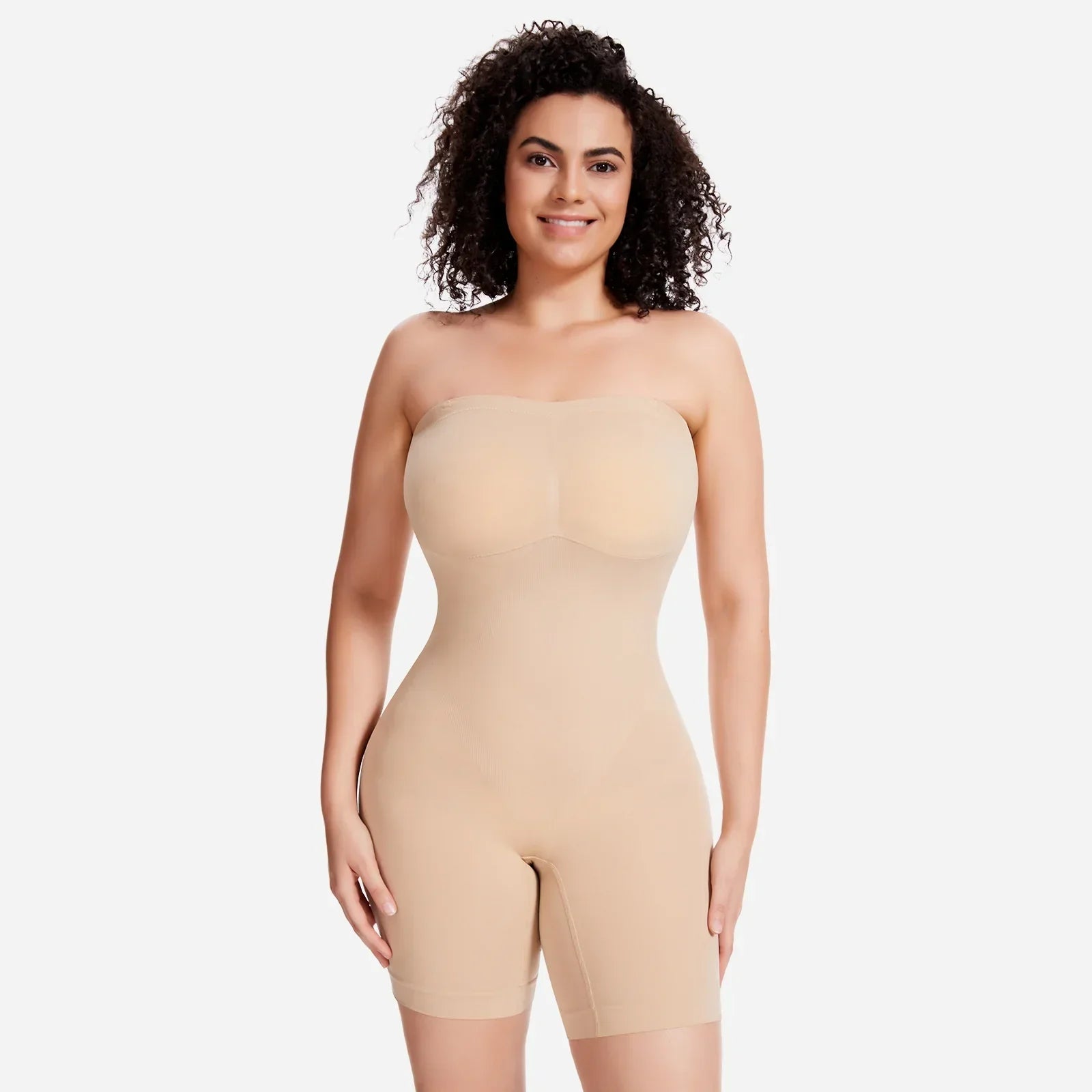 Woman wearing Formivelle nude convertible strapless sculpting bodysuit on white background
