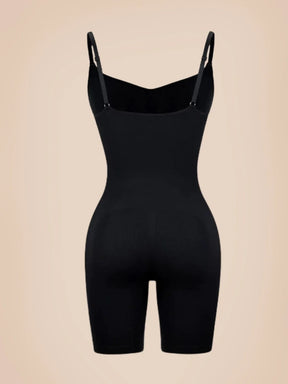 Black mid-thigh Formivelle bodysuit shapewear with adjustable straps on beige background