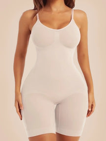 Formivelle sculpting mid-thigh bodysuit in nude, seamless shapewear for women