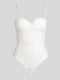 Formivelle white push-up corset bodysuit with straps on beige background