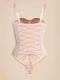 Nude Formivelle push-up corset bodysuit with lace-up front and adjustable straps on neutral background