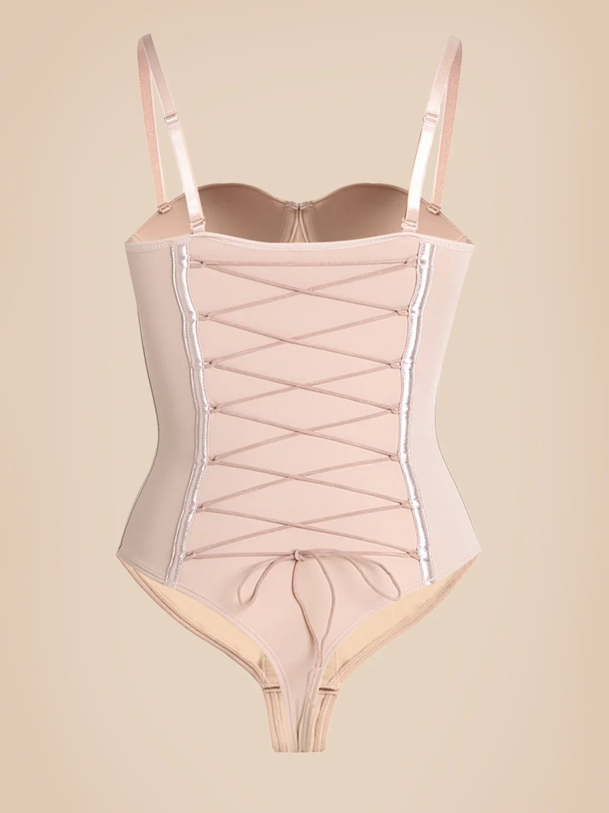 Nude Formivelle push-up corset bodysuit with lace-up front and adjustable straps on neutral background