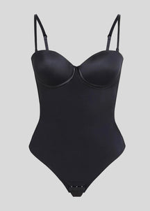 Formivelle black push-up corset bodysuit with adjustable straps on beige background