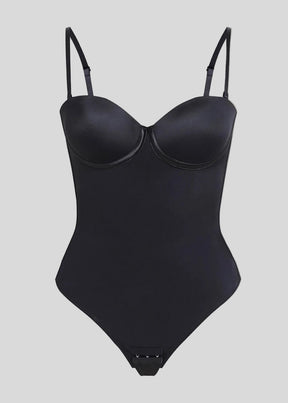 Formivelle black push-up corset bodysuit with adjustable straps on beige background