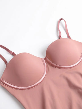 Blush pink Formivelle push-up corset bodysuit with smooth cups and adjustable straps