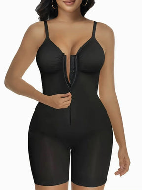 Woman wearing Formivelle black sculpting bodysuit with front zip and adjustable straps